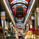 The famous “black gate” lantern of Kuromon Food Market.