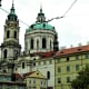 The church of St. Nicholas divides the square.