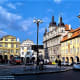 The lower side of the square.