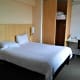 The bed and wardrobe.
