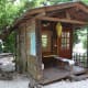 The cabin is just big enough for a couple or a single traveler, and has a spacious porch.