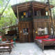 The treehouse sits above the common areas and has its own indoor & outdoor spaces and its own ensuite bathroom.
