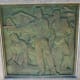 Bas relief showing military service to country.
