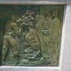 Bas Relief showing the Berlin Wall being torn down with Presidents Bush and Gorbachev to the side.