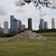 View of the Houston Police Officers' Memorial and downtown buildings