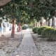 Shaded paths by the villas.