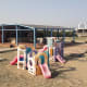 Kids play area and beach bar.