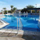 Steps down by main pool.
