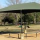 Shaded seating areas in Congressman Bill Archer Park