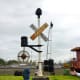 Old railroad crossing signal on display