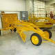 Bright yellow soil grader