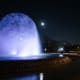 The fountain illuminated at night