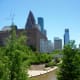 View of the Gus S. Wortham Center (on the left) along Buffalo Bayou in downtown Houston, Texas