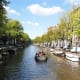 Open boat on a sunny day in Amsterdam.