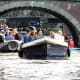 Taking to the water in a motor boat in Amsterdam.