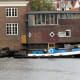 Canal tug boat pulling barges.
