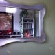 Peaceful feng shui energy is created with this mirror.