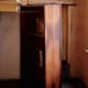 A wooden bookcase covers the hidden door in Anne Frank's house where they were hiding.
