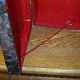 Ribbon hinge stoppers-- the glue will dry clear.