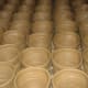 Lines of clay jars at Burnayan/the Vigan House of Pottery