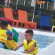 Building a Lego Fortress at the pool.