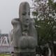 Statue by riverbank of Perfume River, Hue