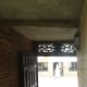 Entrance Door and Passage Looking out Onto Street