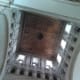Central Escalating Art, Crowned in Warm Wood
