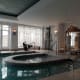 The jacuzzi with rowing machine behind.
