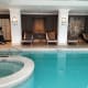 Sunbeds in alcoves by the pool.