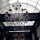 Impressive chandelier in the glass lounge.