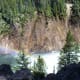 Rainbow in the midst in Upper Yellowstone Falls in Yellowstone National Park