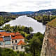 River Vltava with part of the fortress at Vysehrad in the foreground.