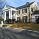 The front entrance features two stone lions added by Elvis shortly after he purchased the house.