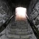 Steps out of the tomb.