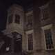 This photo, sent by reader, Kelly Halterman, shows what appears to be a face in the top window, second from the right, second pane down on the right.