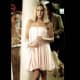 Carrie Bradshaw is using flowy dresses to hide Sarah Jessica Parker's baby bump.