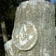 Note the square and compass design (Masonic symbol) on this Woodmen monument