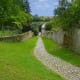 A narrow path running parallel to the fortification wall.