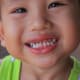 A little boy in the village shows why the nation of Thailand is sometimes known as the 'Land of Smiles'