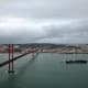 Lisbon and the 25 de Abril Bridge whose reddish tint remind me of the Golden Gate