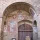 Palazzo del Popolo . Notice the coat of arms on the walls.