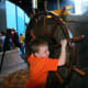 Spinning a ship's wheel. Both boys liked this little "island."