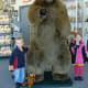 Alex and Grace next to a HUGE bear!