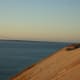 The color of the dunes changes as the sun sets.
