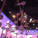Tinker Toys suspended above the line to the Toy Story Midway Mania Ride