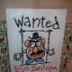 Mr. Potato Head wanted sign located on the way into the Toy Story Midway Mania Ride