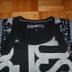 Fold in the sleeves.