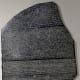 See the Rosetta Stone (replica), circa 196 B.C.E., Egypt. Original is in the British Museum, London, U.K.