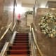 The beautiful stairway leading from the first floor lobby and lounge area to additional lounge space on the second floor.